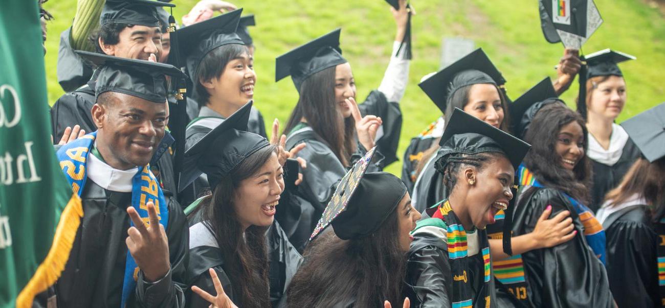 Center for International Studies students pose for a photo at graduate commecement.